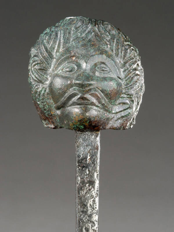 Achsnagel mit menschlichem Kopf aus der Keltenstadt von Manching.